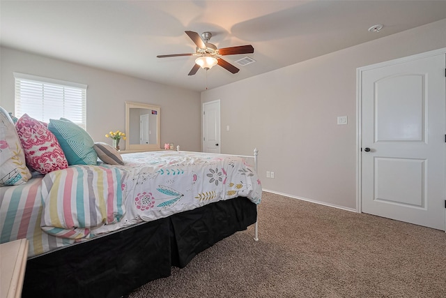 23806 Naples Shore Dr, Katy, TX 77493 - carpeted bedroom with baseboards, a ceiling fan, and visible vents