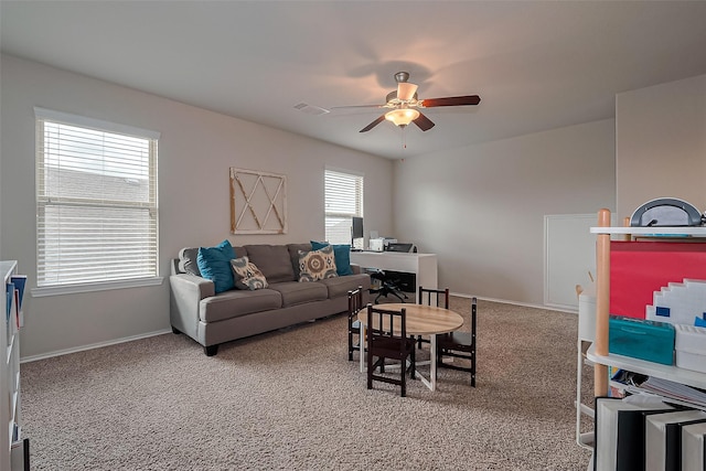 23806 Naples Shore Dr, Katy, TX 77493 - living room featuring visible vents, light colored carpet, baseboards, and ceiling fan
