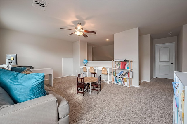 23806 Naples Shore Dr, Katy, TX 77493 - carpeted living area featuring visible vents, baseboards, and a ceiling fan