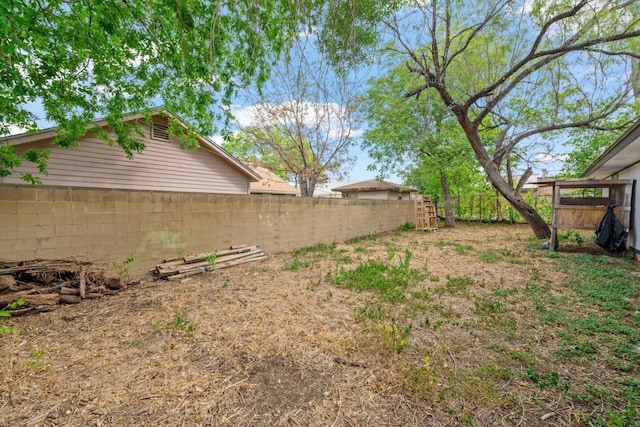 view of yard with fence