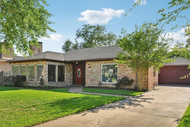 1006 Glacier Hill Dr, Houston, TX 77077 - view of front of home with driveway, an attached garage, a front lawn, and brick siding