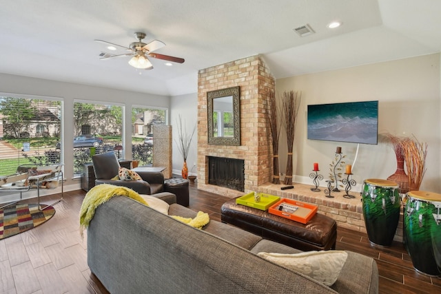 1006 Glacier Hill Dr, Houston, TX 77077 - living room with ceiling fan, a fireplace, wood finished floors, baseboards, and recessed lighting