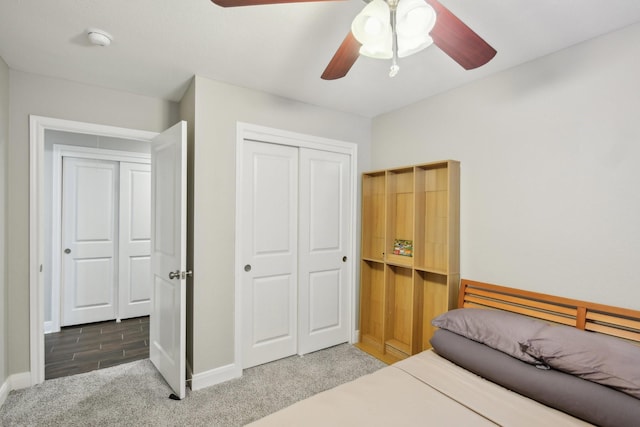 1006 Glacier Hill Dr, Houston, TX 77077 - carpeted bedroom with a closet, baseboards, and ceiling fan