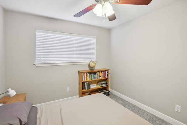 1006 Glacier Hill Dr, Houston, TX 77077 - bedroom with carpet, baseboards, multiple windows, and a ceiling fan