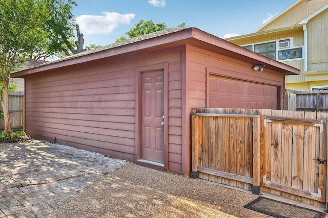 1006 Glacier Hill Dr, Houston, TX 77077 - view of outbuilding with a garage