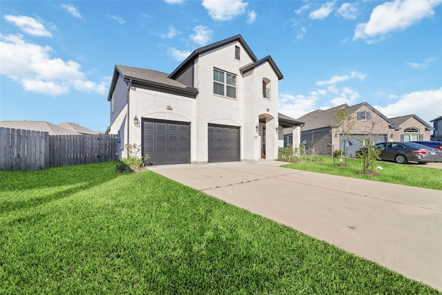 view of front of house with a garage, fence, a front lawn, brick siding, and concrete driveway