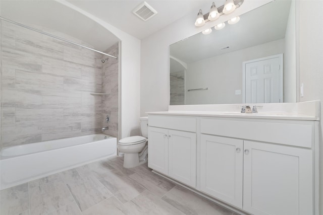 full bath featuring visible vents, toilet, vanity, and shower / bathtub combination