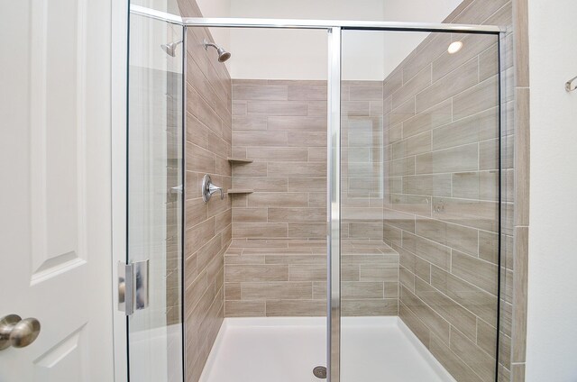14211 Walworth Creek Ct, Rosharon, TX 77583 - bathroom with a shower stall