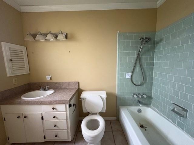 bathroom featuring crown molding, washtub / shower combination, tile patterned flooring, and vanity