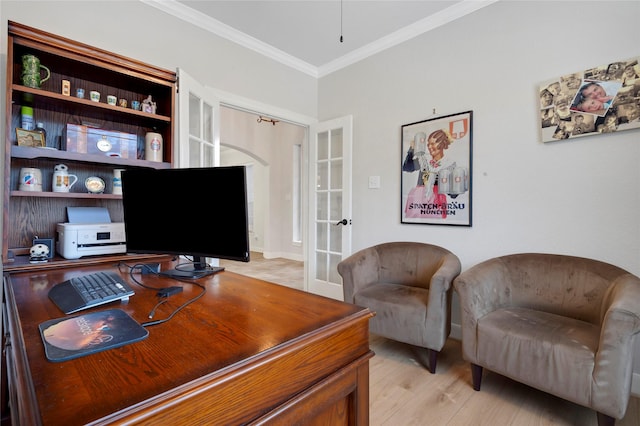 office area featuring french doors, ornamental molding, and light wood-style floors