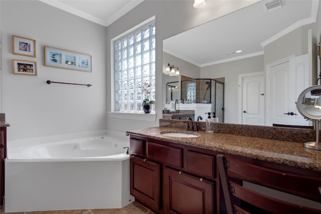 bathroom featuring a wealth of natural light, a shower stall, a bath, and visible vents
