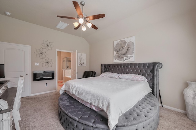 carpeted bedroom featuring connected bathroom, a ceiling fan, visible vents, lofted ceiling, and baseboards