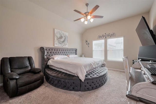 bedroom with light carpet, baseboards, vaulted ceiling, and ceiling fan