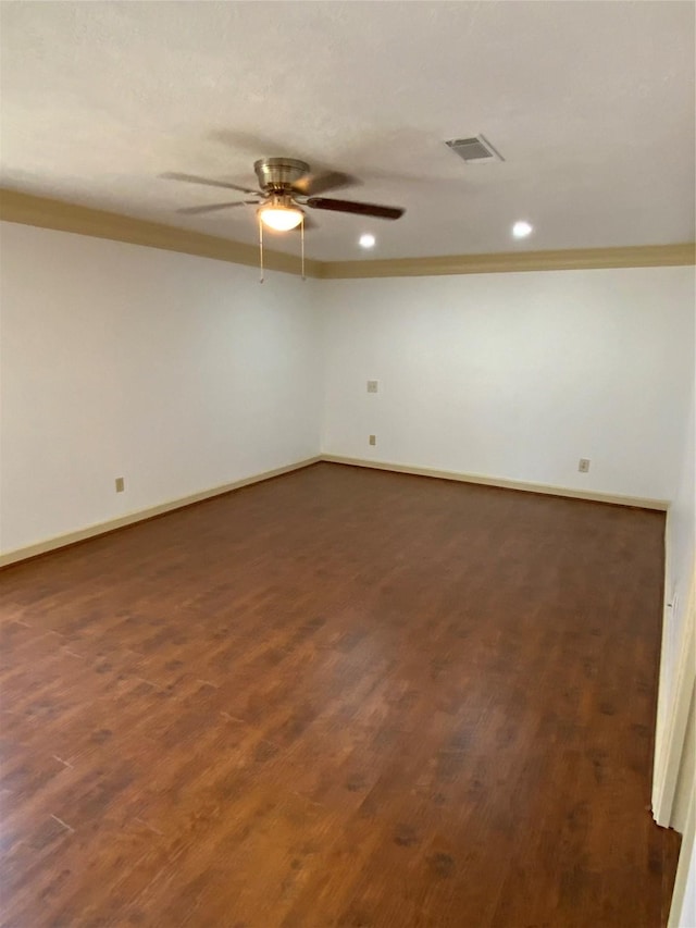 empty room with a ceiling fan, visible vents, recessed lighting, and dark wood-type flooring