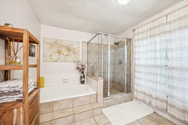 21263 Park Bluff Dr, Katy, TX 77450 - full bathroom featuring a garden tub, tile patterned floors, and a stall shower