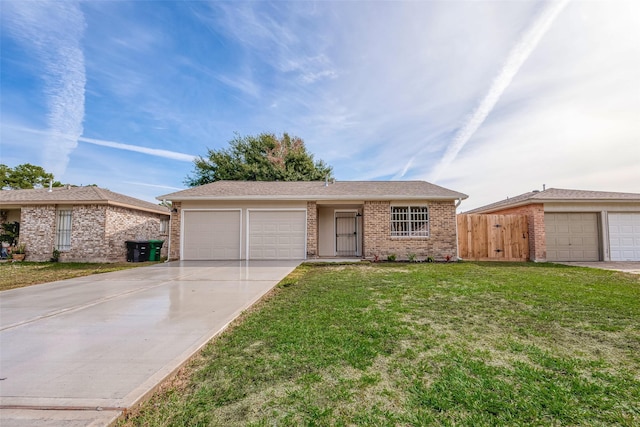8714 Valley Flag Dr, Houston, TX 77078 - ranch-style house with a front yard, fence, brick siding, an attached garage, and concrete driveway