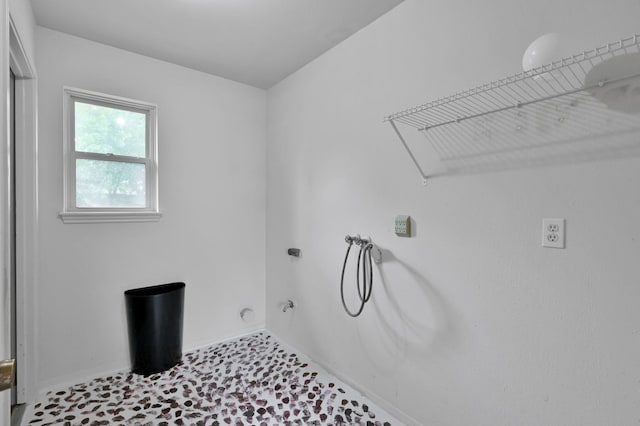 clothes washing area featuring baseboards, gas dryer hookup, laundry area, and hookup for a washing machine
