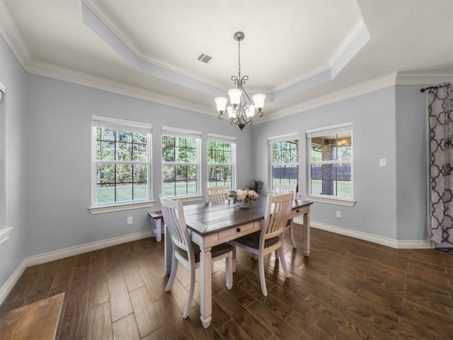 19507 Balsas Dr, Porter, TX 77365 - dining area featuring visible vents, a tray ceiling, an inviting chandelier, and dark wood finished floors