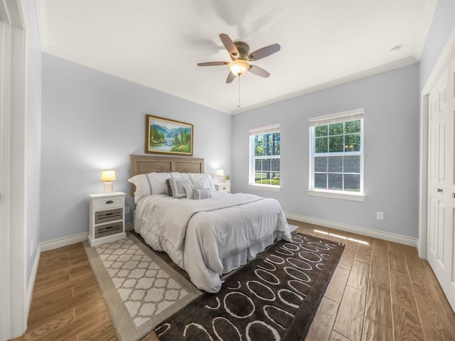 19507 Balsas Dr, Porter, TX 77365 - bedroom featuring a ceiling fan, wood finished floors, baseboards, and ornamental molding