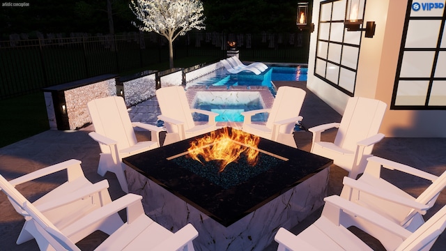 view of pool with a fenced in pool, a patio, fence, and an outdoor fire pit