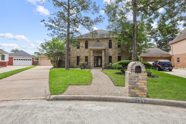 view of front of property with a front yard and stone siding