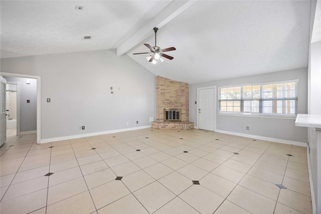 unfurnished living room featuring vaulted ceiling with beams, baseboards, a ceiling fan, and a brick fireplace