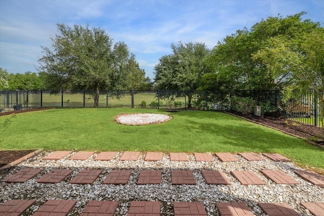 view of yard with a fenced backyard
