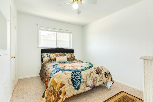 bedroom featuring carpet flooring, baseboards, and a ceiling fan