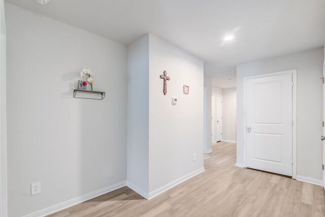 15560 Briar Forest Dr, Conroe, TX 77306 - empty room featuring light wood-style flooring, baseboards, and recessed lighting