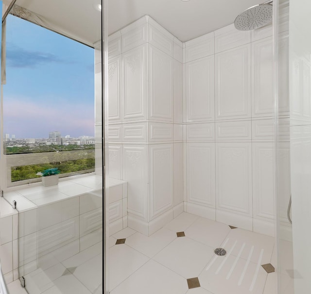 101 Westcott St Unit 2001, Houston, TX 77007 - bathroom featuring walk in shower, tile patterned flooring, and a city view