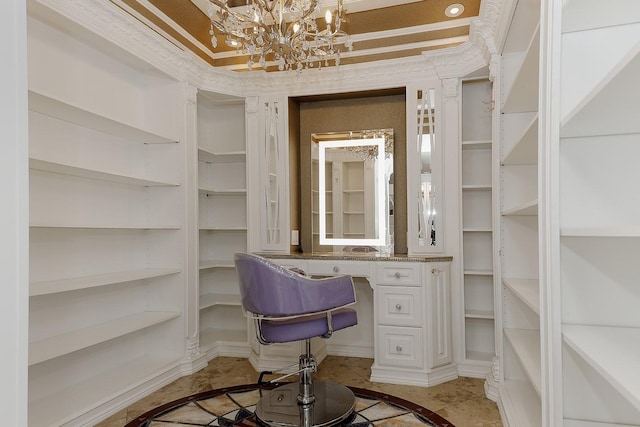 101 Westcott St Unit 2001, Houston, TX 77007 - spacious closet with built in study area and an inviting chandelier