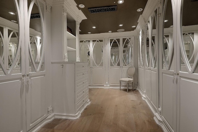 101 Westcott St Unit 2001, Houston, TX 77007 - spacious closet with visible vents and light wood-style flooring