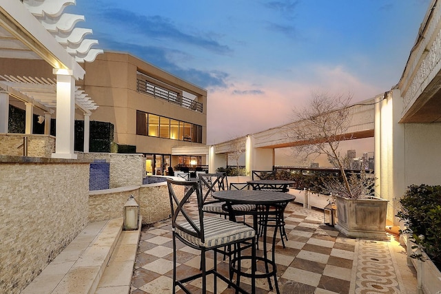 101 Westcott St Unit 2001, Houston, TX 77007 - patio terrace at dusk featuring a pergola