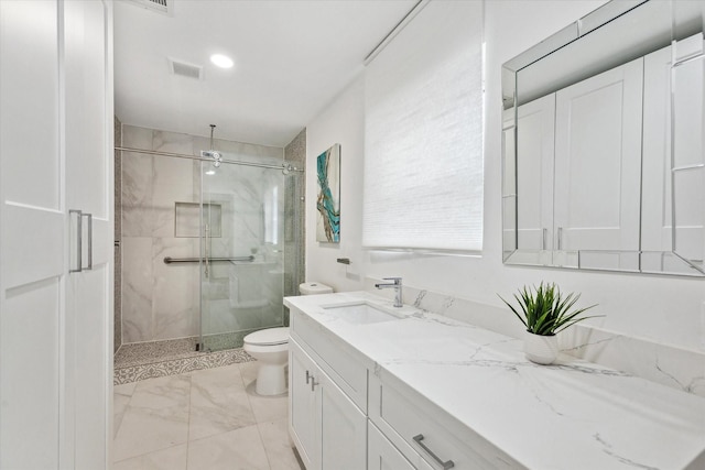 full bathroom with marble finish floor, toilet, vanity, visible vents, and a marble finish shower