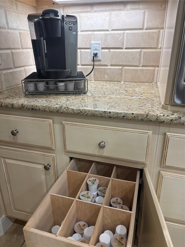 2469 S Bramlet Dr, Conroe, TX 77304 - detailed view of cream cabinets and tasteful backsplash