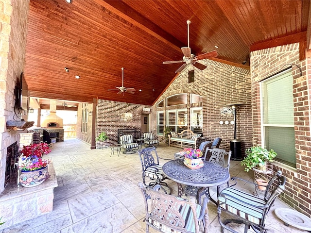 view of patio / terrace with outdoor dining area and ceiling fan