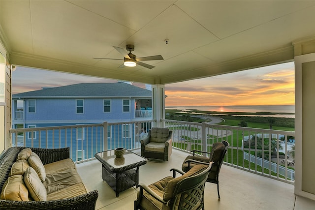 27020 Estuary Dr Unit 301, Galveston, TX 77554 - balcony at dusk featuring a water view and ceiling fan