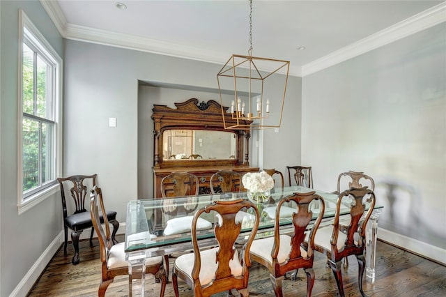 609 Reinicke St, Houston, TX 77007 - dining room featuring a chandelier, a healthy amount of sunlight, and ornamental molding