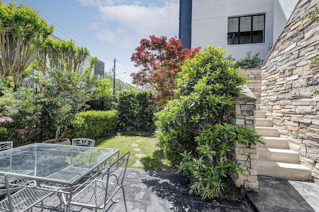 609 Reinicke St, Houston, TX 77007 - view of patio / terrace featuring fence and outdoor dining area