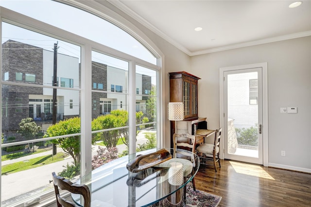 609 Reinicke St, Houston, TX 77007 - living area with recessed lighting, dark wood-style floors, baseboards, and crown molding