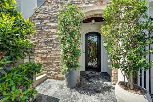 609 Reinicke St, Houston, TX 77007 - view of exterior entry with stone siding