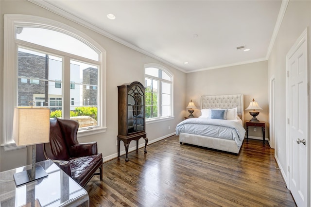 609 Reinicke St, Houston, TX 77007 - bedroom with wood finished floors, baseboards, ornamental molding, and recessed lighting