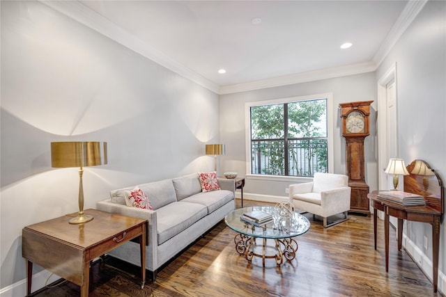 609 Reinicke St, Houston, TX 77007 - living room featuring wood finished floors, baseboards, ornamental molding, and recessed lighting