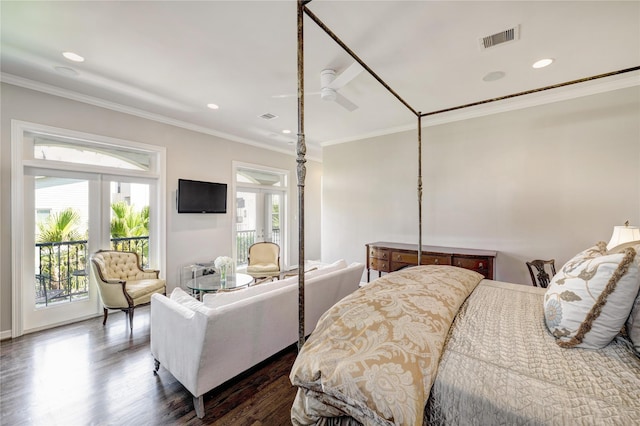 609 Reinicke St, Houston, TX 77007 - bedroom with visible vents, dark wood finished floors, crown molding, recessed lighting, and access to exterior
