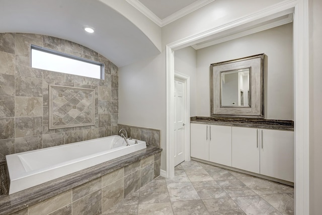 609 Reinicke St, Houston, TX 77007 - full bath featuring ornamental molding, vanity, and a garden tub