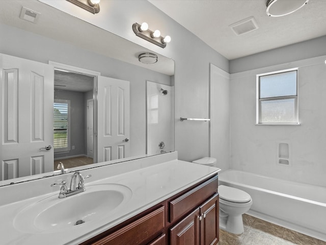 2001 Sedona Dr, League City, TX 77573 - full bathroom featuring toilet, vanity, and shower / washtub combination