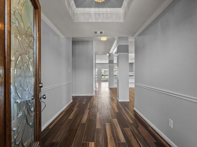 2001 Sedona Dr, League City, TX 77573 - foyer entrance with dark wood finished floors, ornamental molding, baseboards, and a raised ceiling