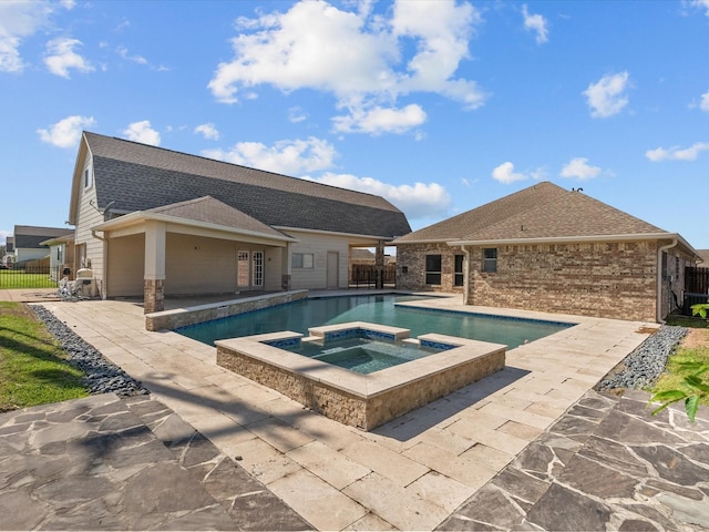2001 Sedona Dr, League City, TX 77573 - view of pool featuring a patio area and a pool with connected hot tub