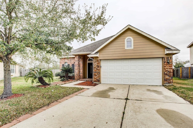 2301 Wimberly Dr, Deer Park, TX 77536 - view of front of property featuring brick siding, concrete driveway, roof with shingles, and an attached garage