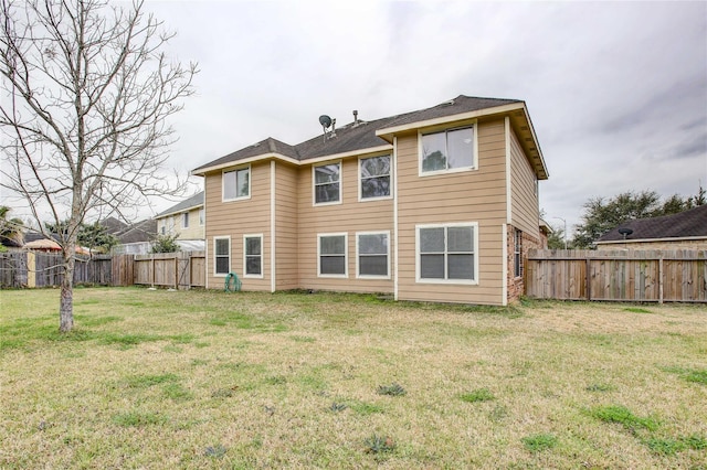 2301 Wimberly Dr, Deer Park, TX 77536 - rear view of property with a fenced backyard